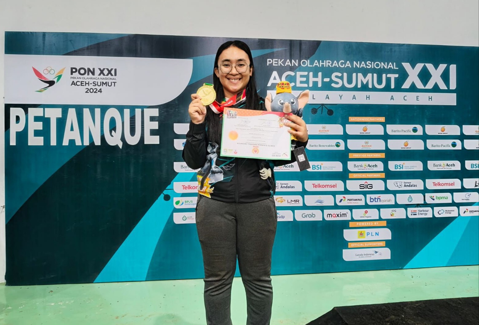 Guru SD Asal Morut Raih Emas di PON 2024