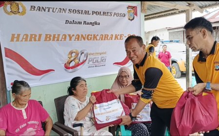 Polres Poso Bakti Religi dan Bansos di Pura Jagat Nata Stana Narayana