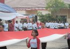 Polres Poso Gelar Pembentangan Merah Putih Sepanjang 81 Meter 