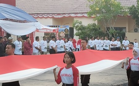 Polres Poso Gelar Pembentangan Merah Putih Sepanjang 81 Meter 