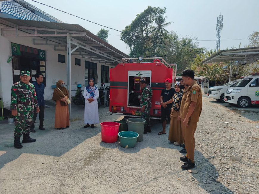 TNI Poso Pesisir Salurkan Bantuan Air Bersih ke Warga